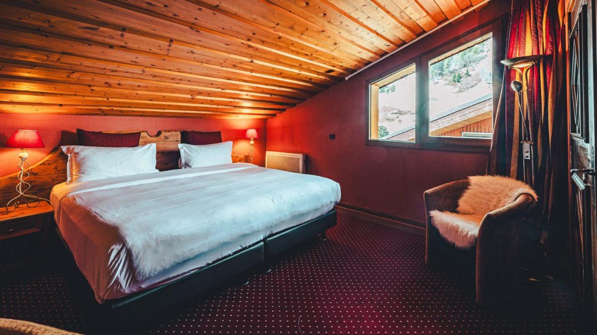 Un ou plusieurs lits dans un hébergement de l'établissement Hotel Mont Vallon