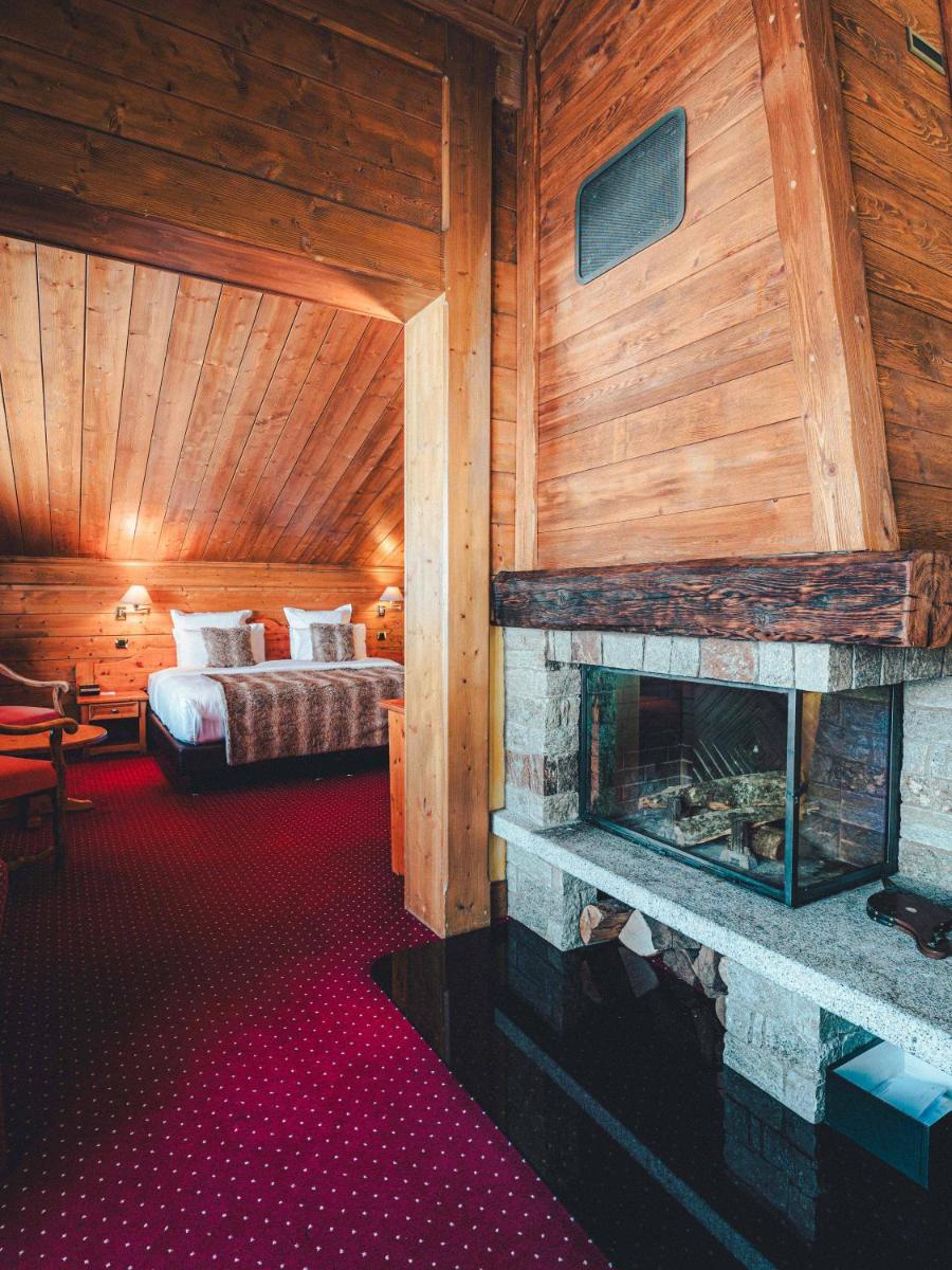 Un ou plusieurs lits dans un hébergement de l'établissement Hotel Mont Vallon