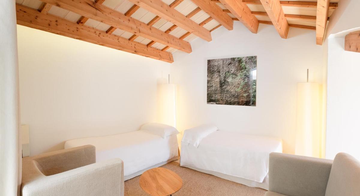 Cama o camas de una habitación en Torralbenc, a Small Luxury Hotel of the World