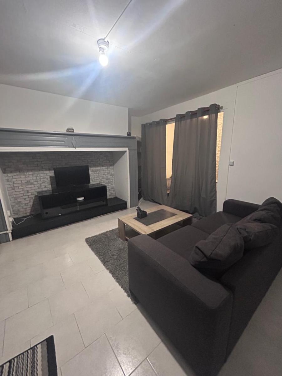 Appartement rez-de-chaussée, centre-ville - Housity