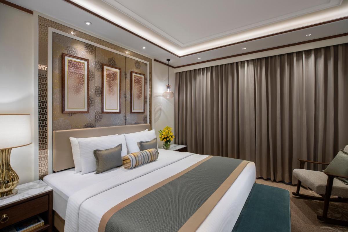 a bedroom with a large bed in a room at Tajview, Agra-IHCL SeleQtions in Agra