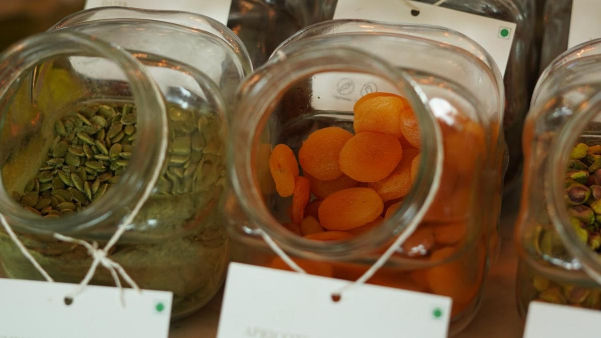 four glass jars filled with carrots and other vegetables at InterContinental Marine Drive Mumbai by IHG in Mumbai