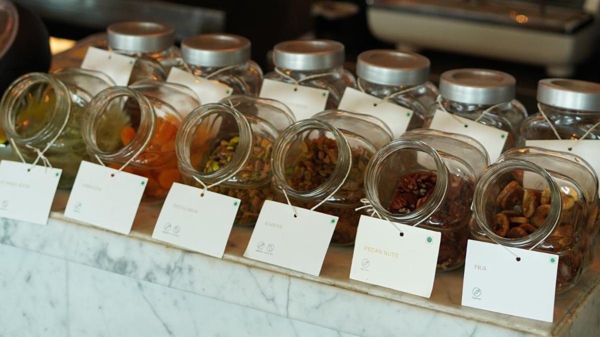 a display of jars of food on a table at InterContinental Marine Drive Mumbai by IHG in Mumbai