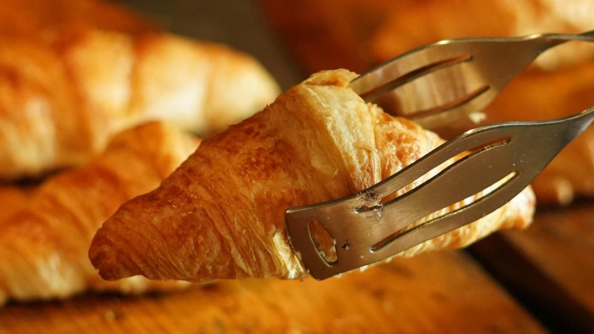 a fork stuck in a piece of bread at InterContinental Marine Drive Mumbai by IHG in Mumbai