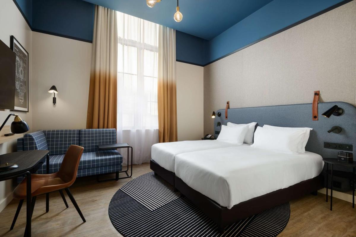 Un ou plusieurs lits dans un hébergement de l'établissement Hyatt Place Rouen