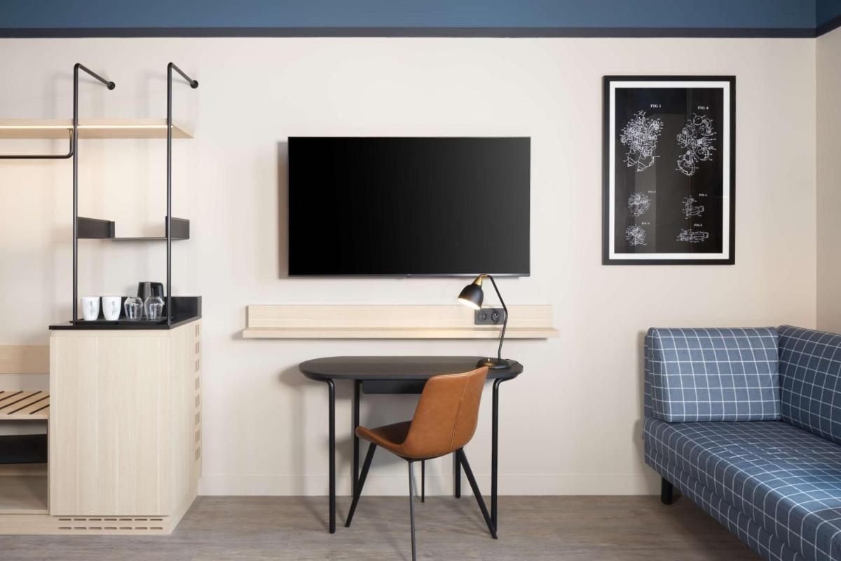 Télévision ou salle de divertissement dans l'établissement Hyatt Place Rouen