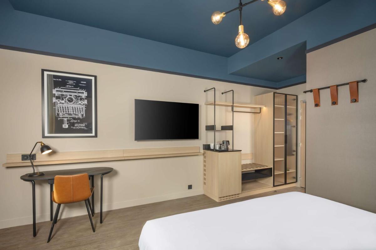 Un ou plusieurs lits dans un hébergement de l'établissement Hyatt Place Rouen
