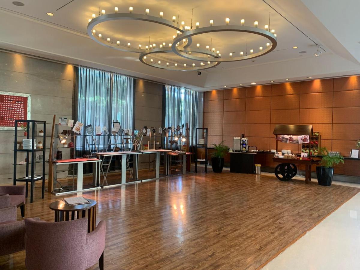a ballroom with a dance floor and a chandelier at Crowne Plaza Today Gurugram by IHG in Gurgaon