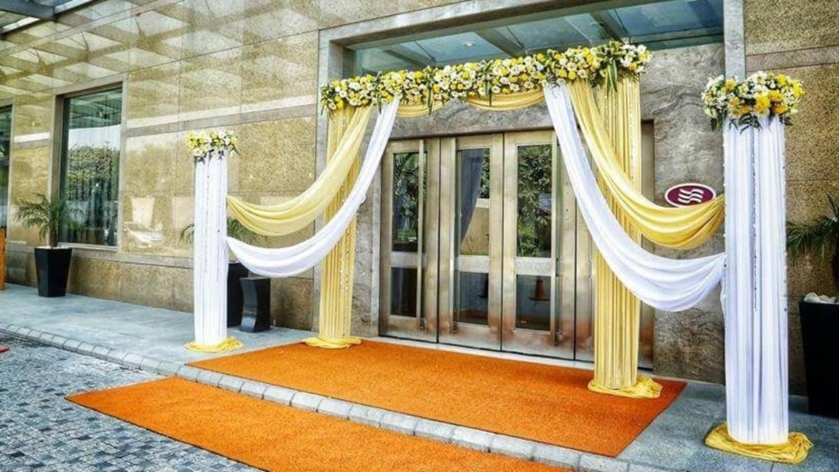 a building with two curtains and a red carpet at Crowne Plaza Today Gurugram by IHG in Gurgaon