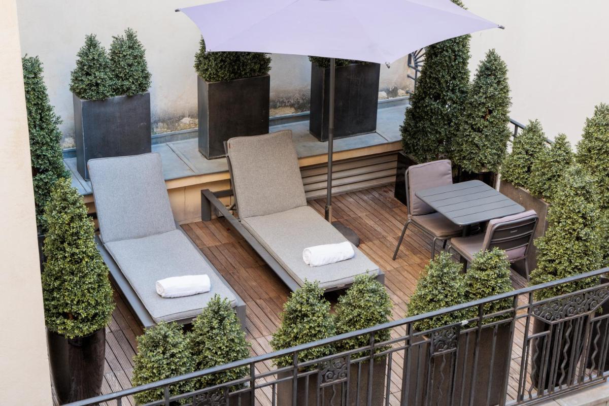 Balcon ou terrasse dans l'établissement Hotel Montaigne