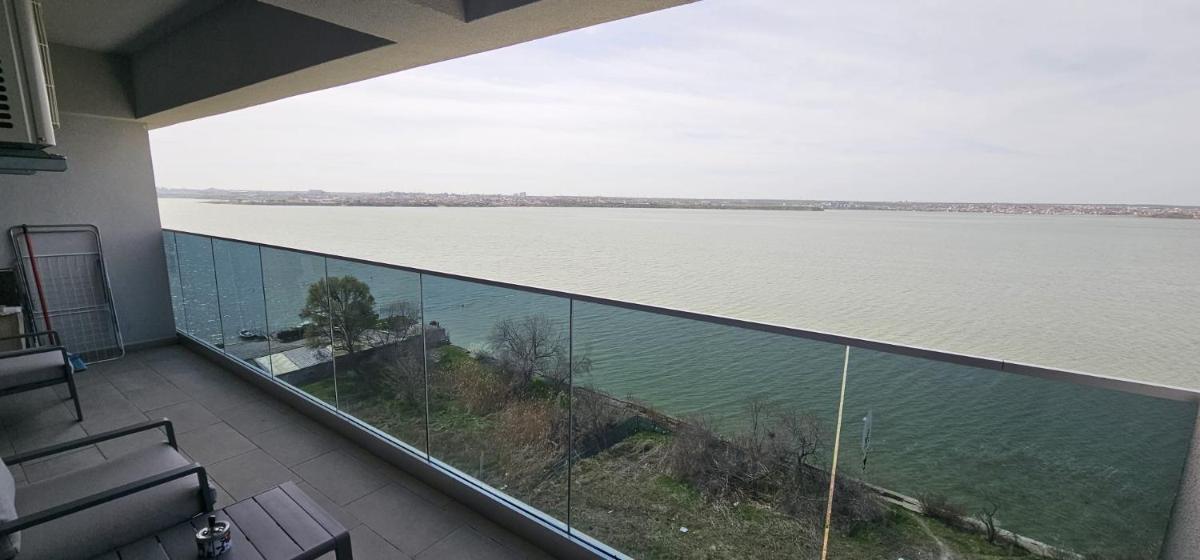 Serenity Lake View Panoramic Suite ApartHotel Top Floor - Housity