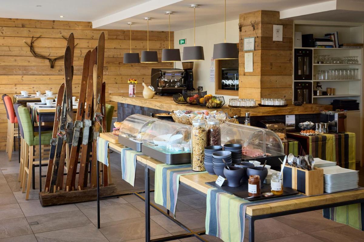Restaurant ou autre lieu de restauration dans l'établissement Hôtel Le Grand Tétras