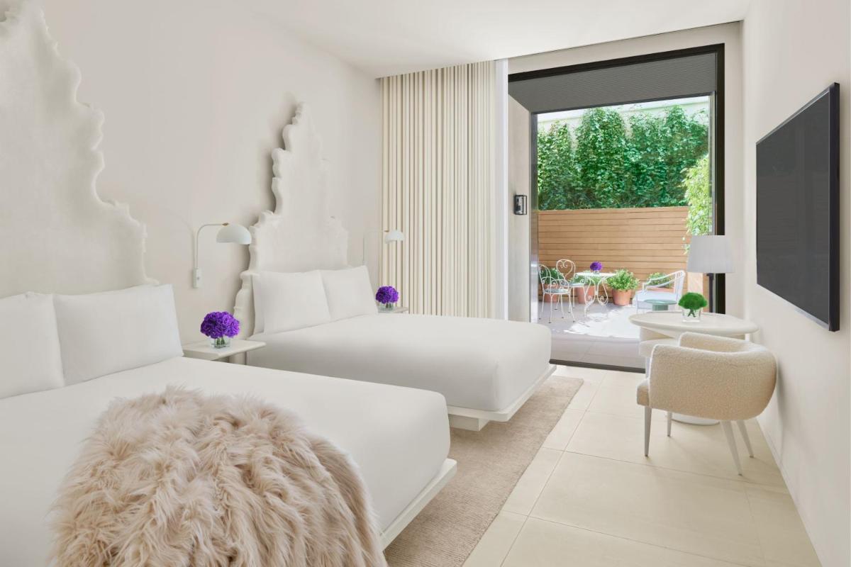 Cama o camas de una habitación en The Madrid EDITION