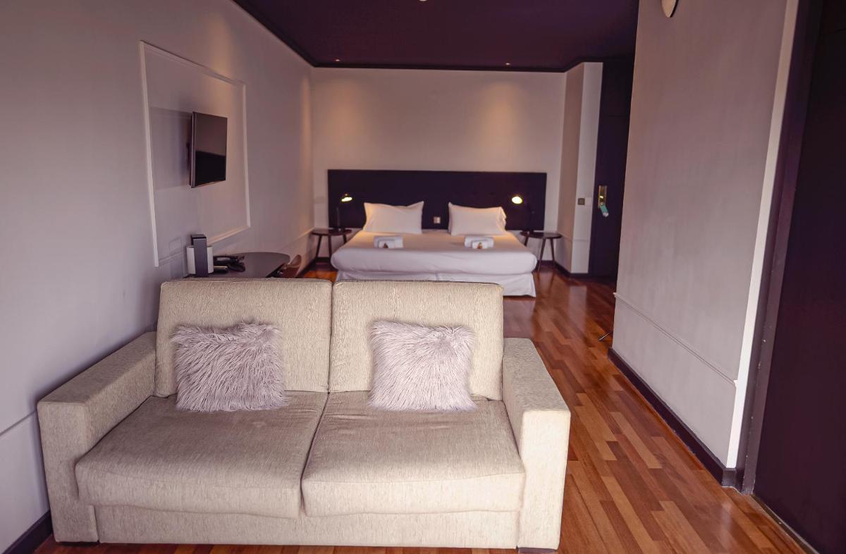 Cama o camas de una habitación en Hotel Hita "Nature Experience" for all