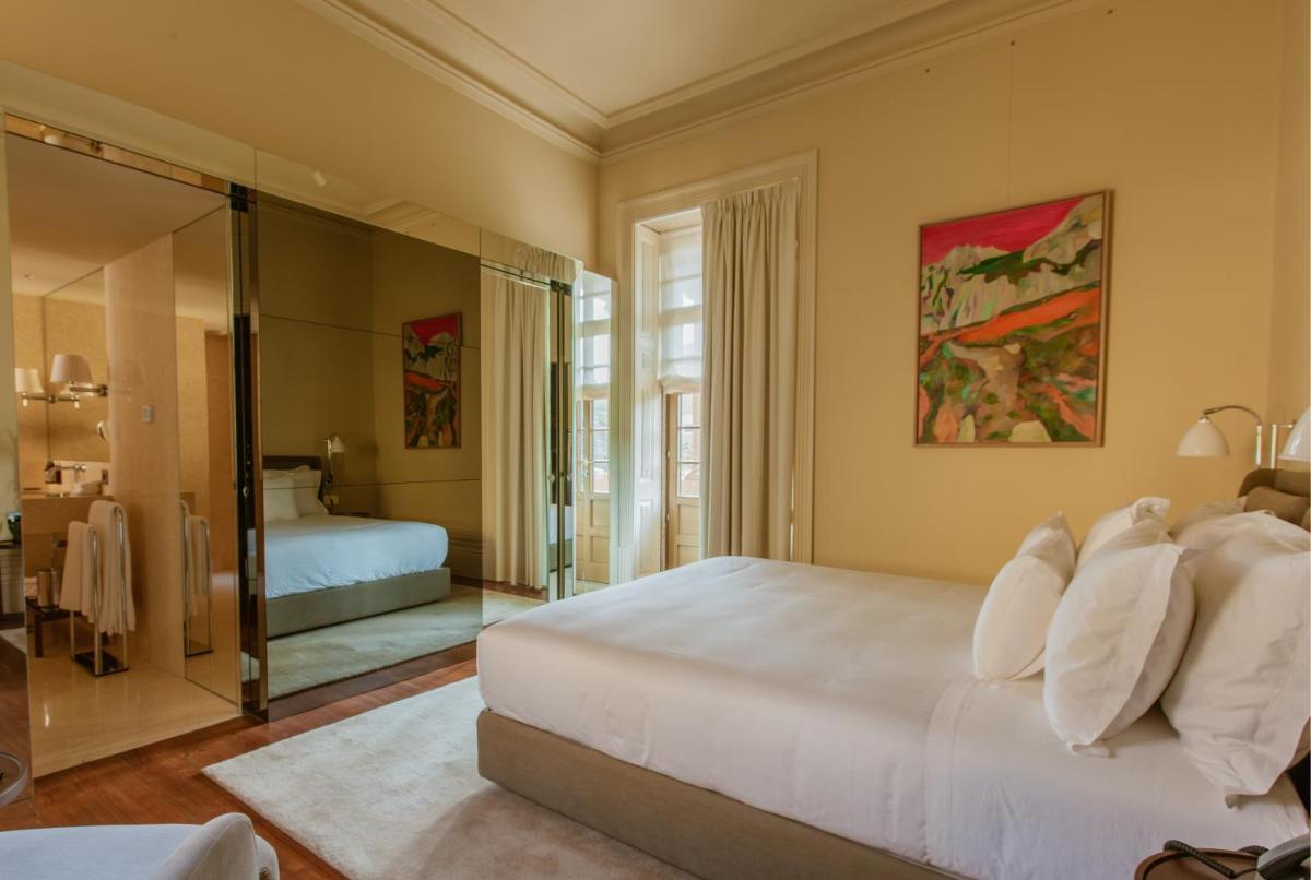 Uma cama ou camas num quarto em Palacete Severo