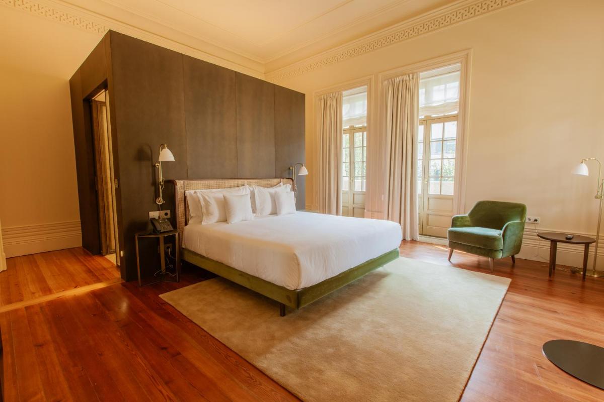 Uma cama ou camas num quarto em Palacete Severo