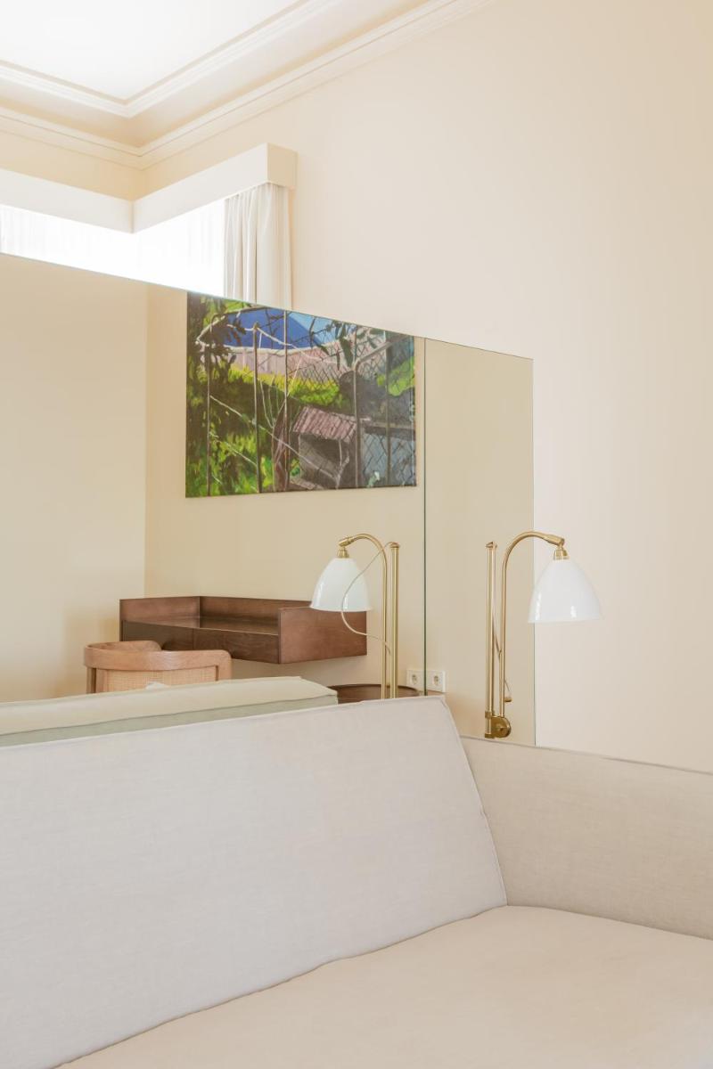 Uma cama ou camas num quarto em Palacete Severo