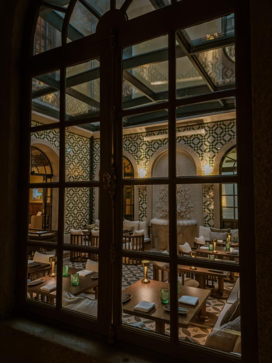 Um restaurante ou outro lugar para comer em Palacete Severo