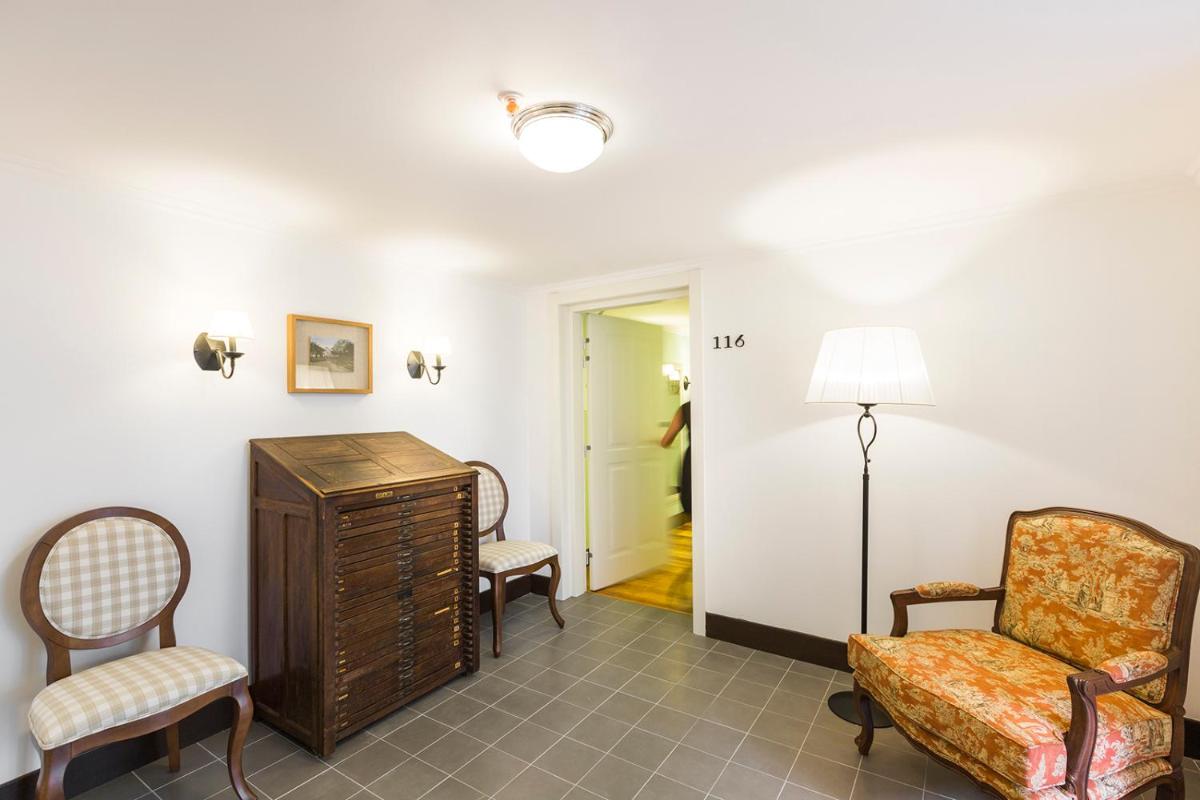 Uma área de estar em Castanheiro Boutique Hotel