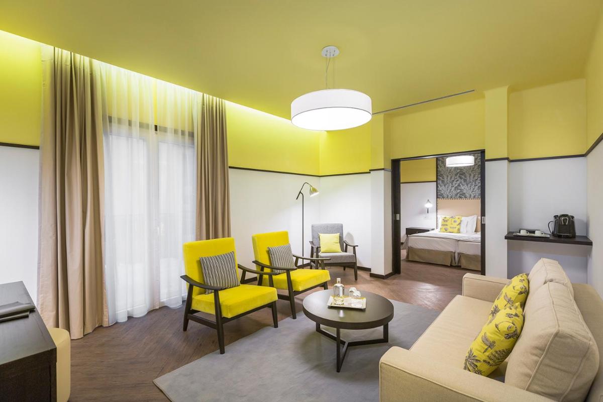 Uma área de estar em Castanheiro Boutique Hotel
