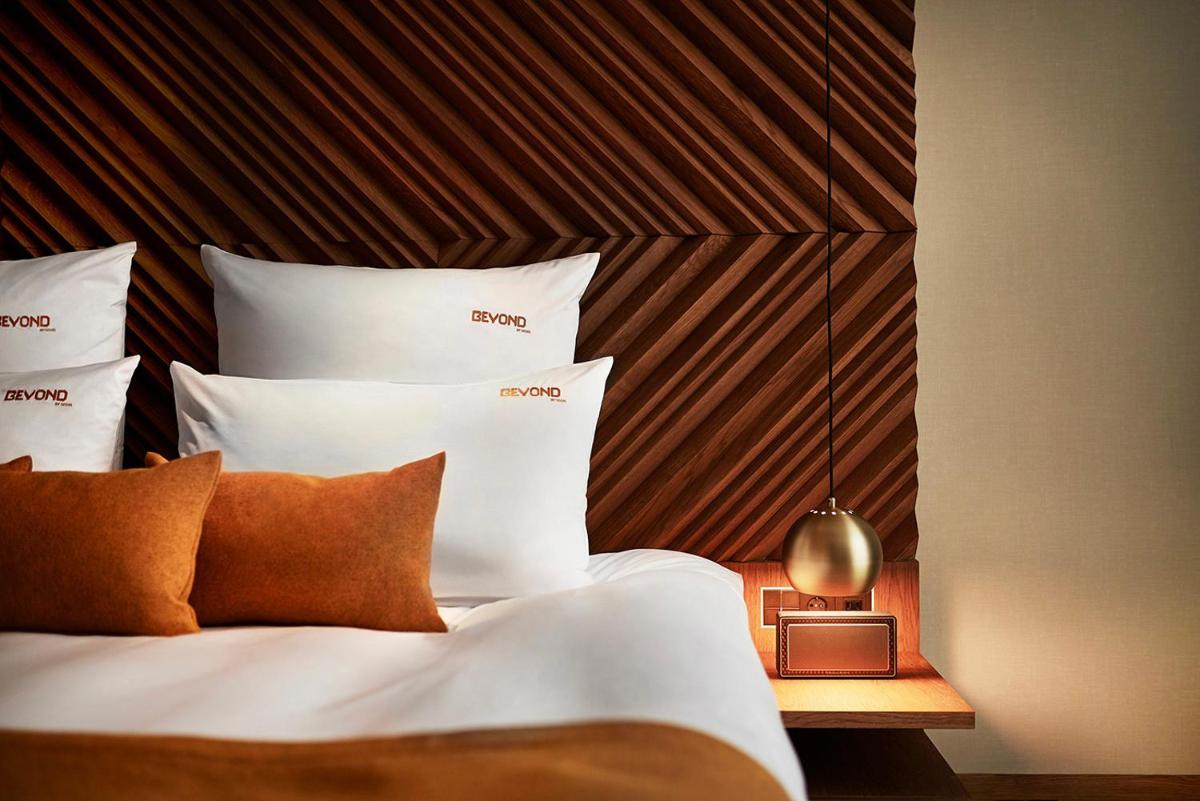 Ein Bett oder Betten in einem Zimmer der Unterkunft BEYOND by Geisel Ein Bett oder Betten in einem Zimmer der Unterkunft BEYOND by Geisel