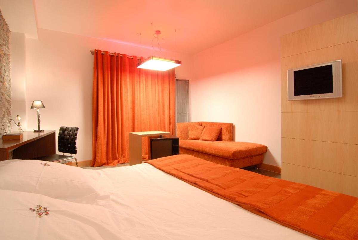 Cama o camas de una habitación en Hotel Casa del Abad