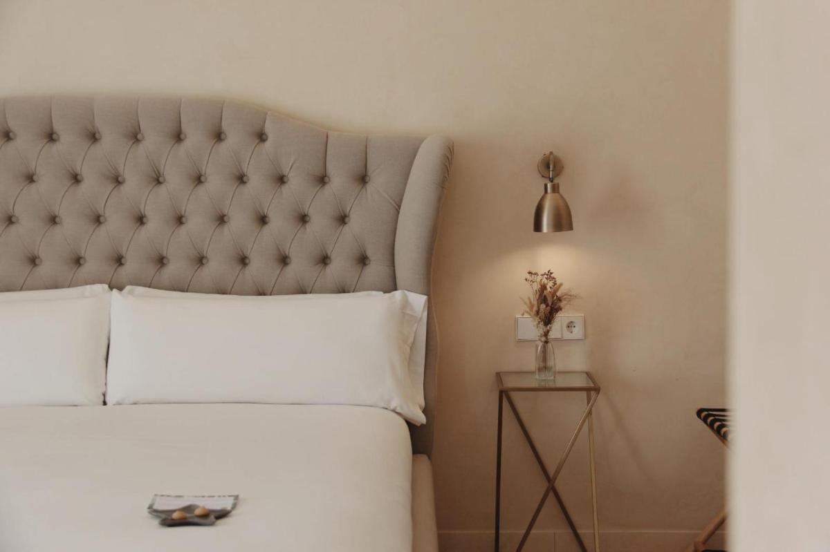 Cama o camas de una habitación en Hotel Palau Macelli & Spa