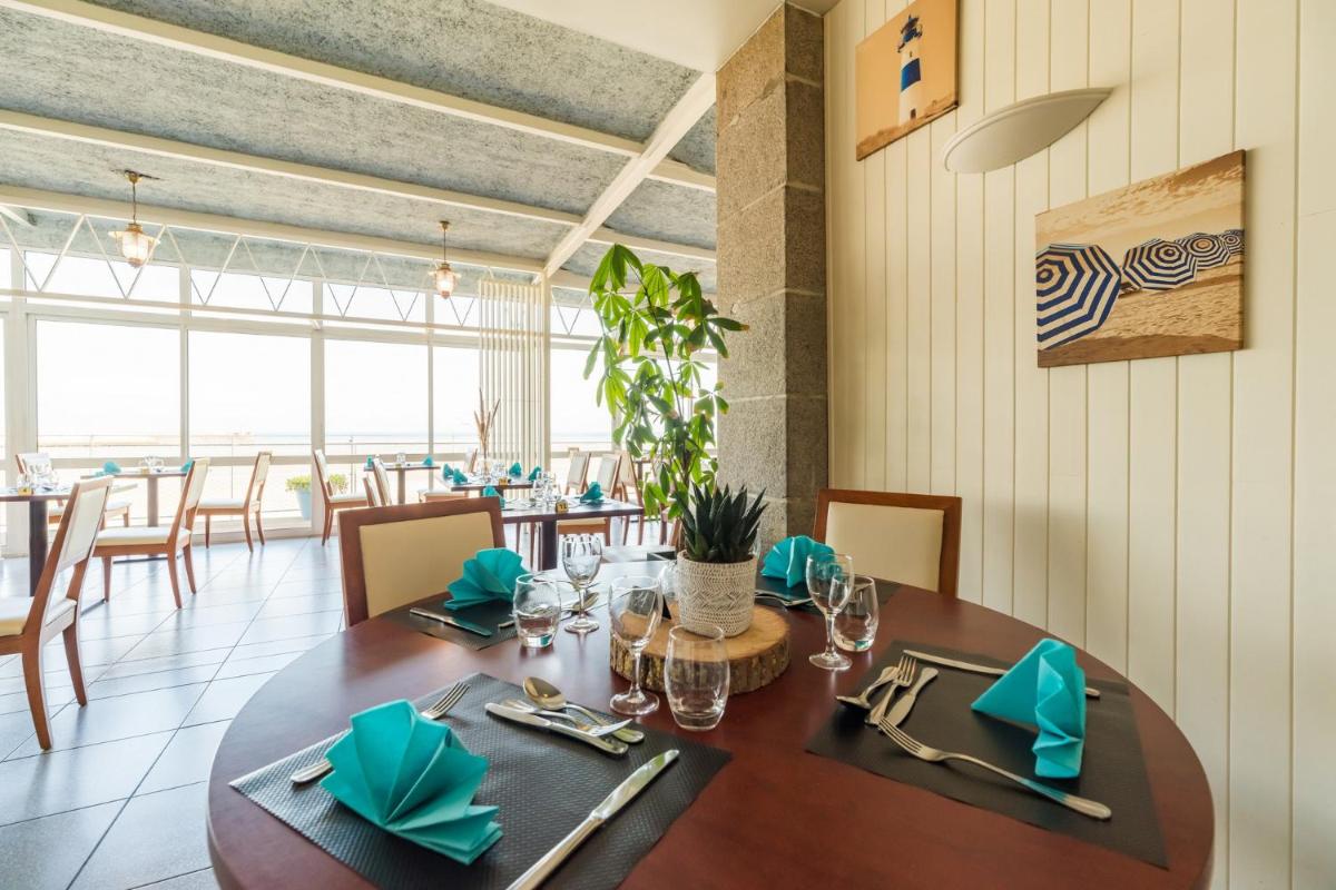 Restaurant ou autre lieu de restauration dans l'établissement Hôtel Miléade de la Plage - Binic