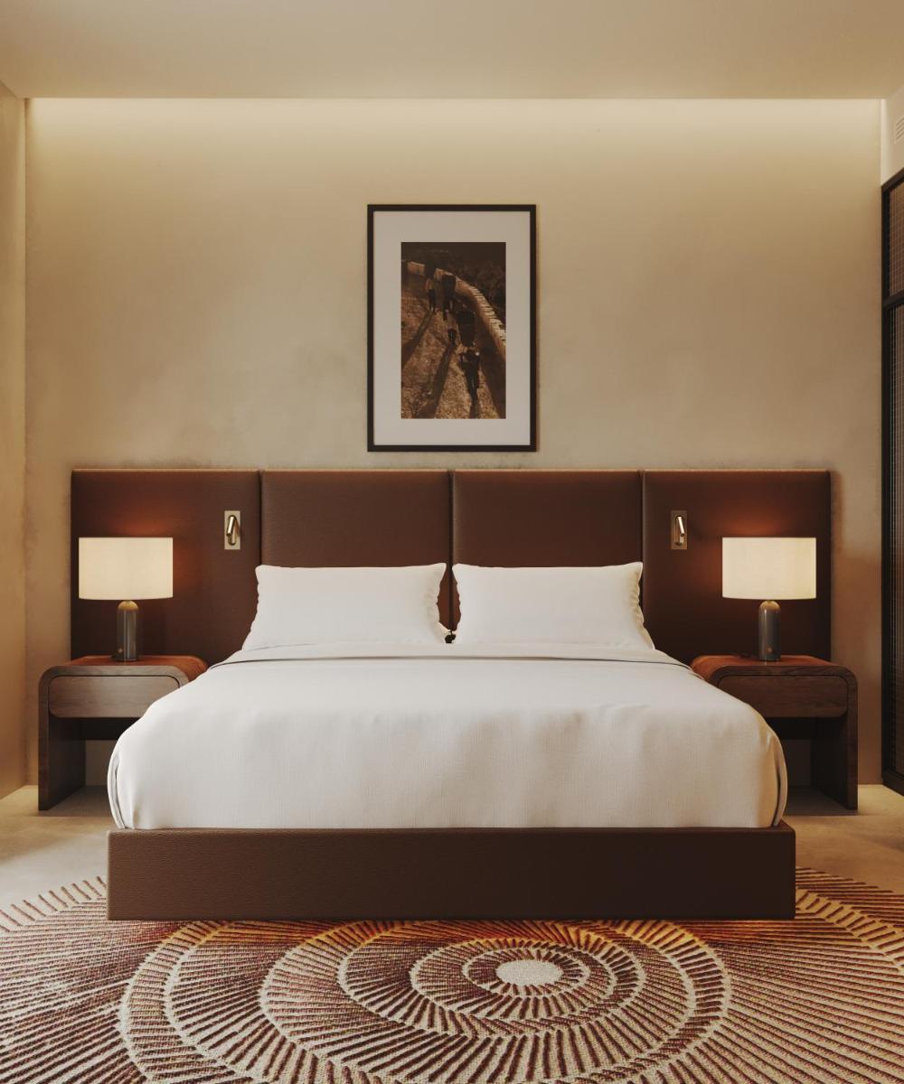 Uma cama ou camas num quarto em Tivoli Kopke Porto Gaia Hotel