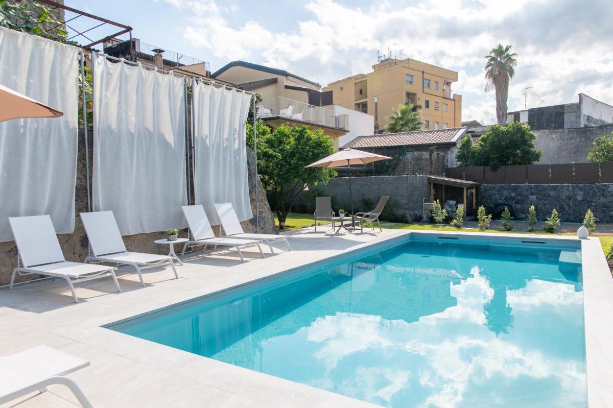 Palazzo Marinella Historic Residence with Pool between Etna Taormina & Sea - Housity