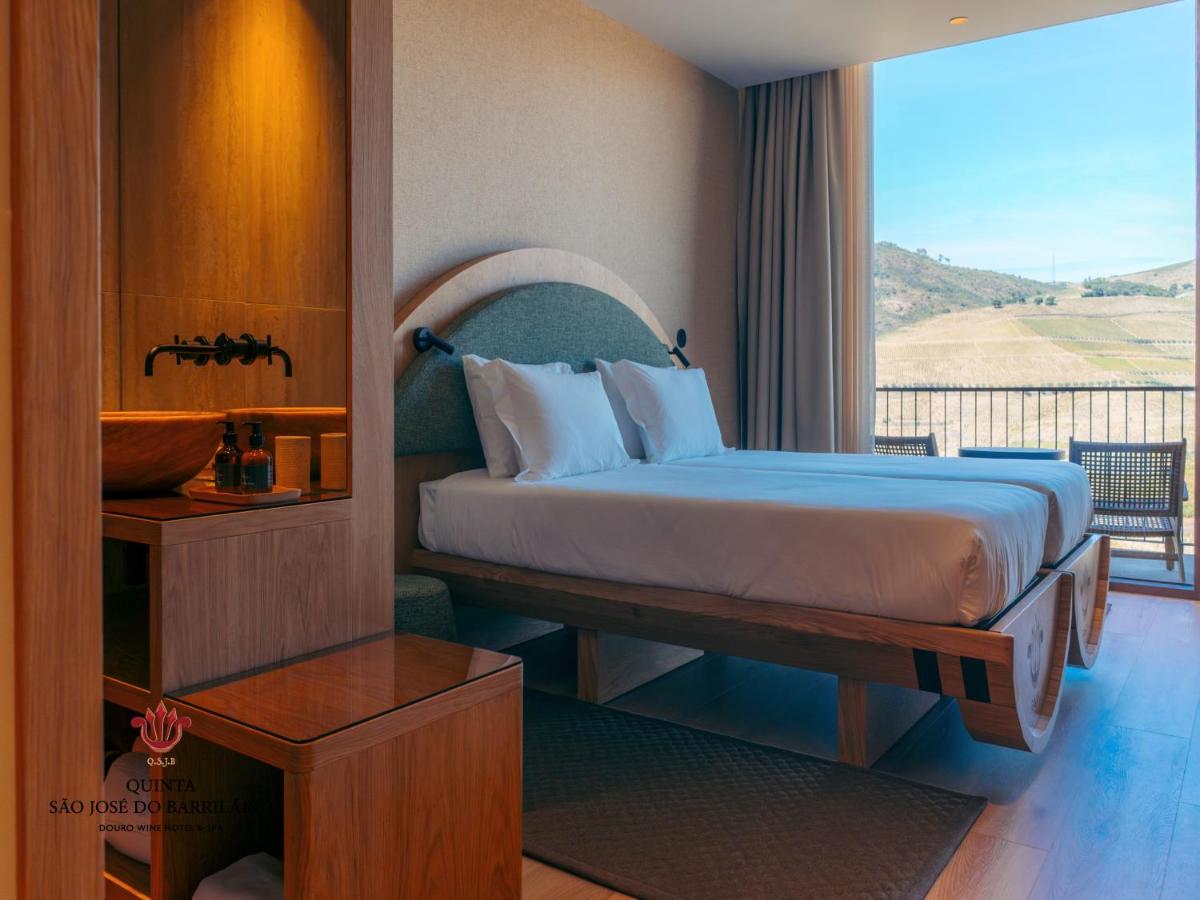 Uma cama ou camas num quarto em Barrilario Douro Wine Hotel e Spa - Quinta São Jose do Barrilario