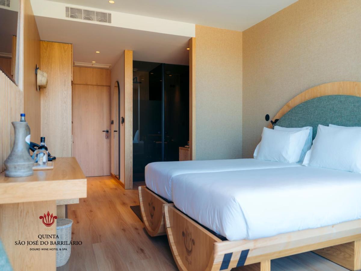 Uma cama ou camas num quarto em Barrilario Douro Wine Hotel e Spa - Quinta São Jose do Barrilario