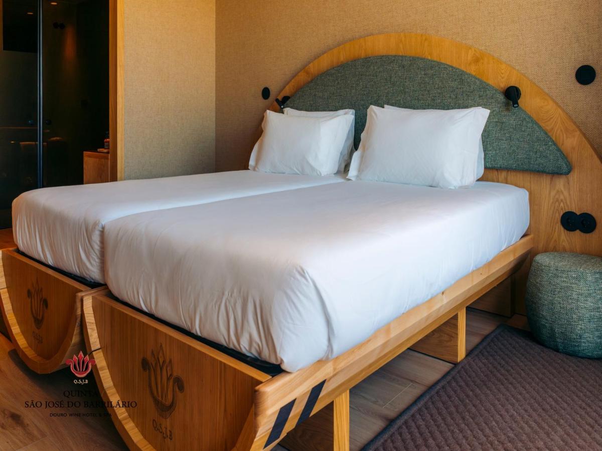 Uma cama ou camas num quarto em Barrilario Douro Wine Hotel e Spa - Quinta São Jose do Barrilario