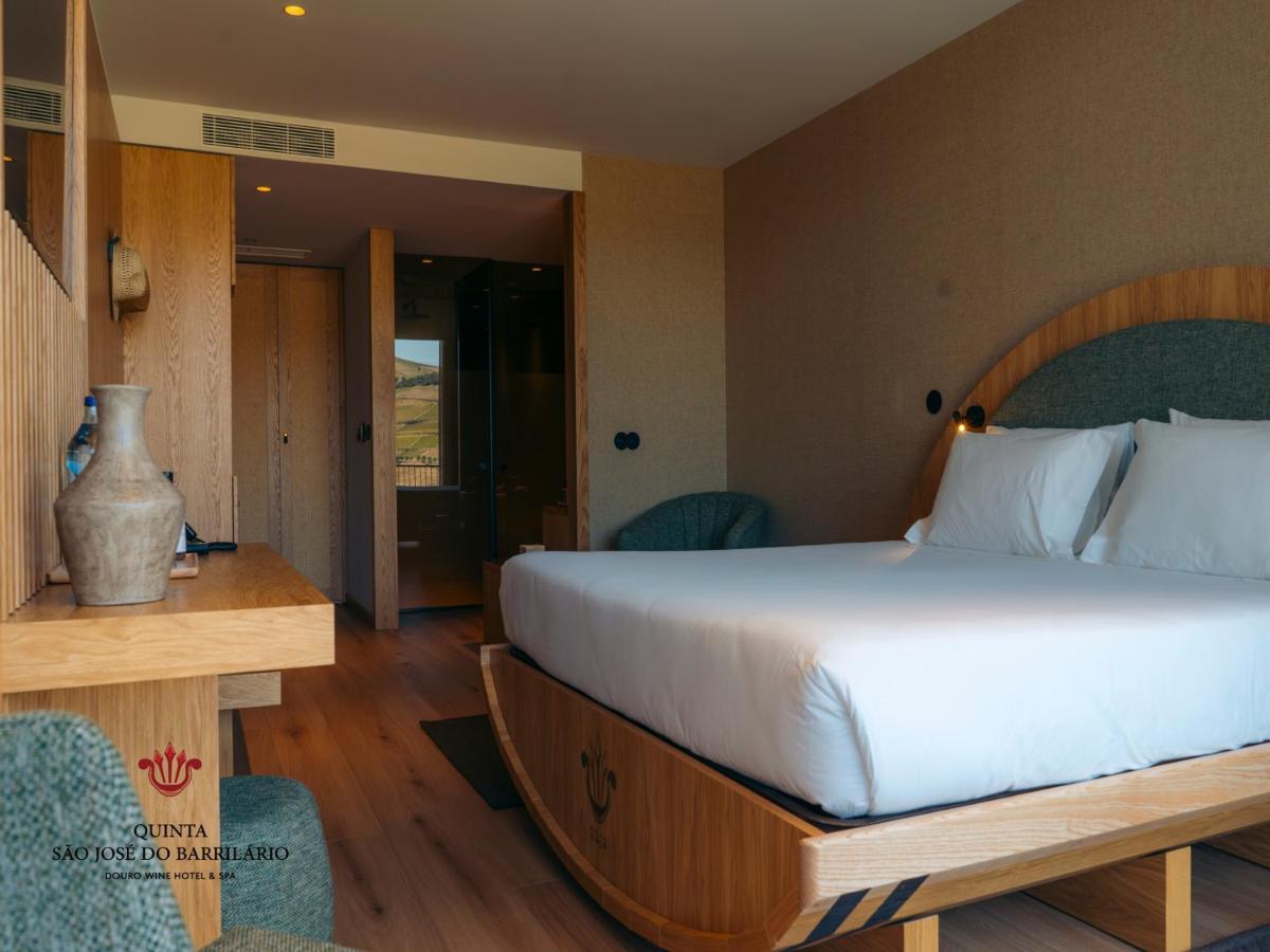Uma cama ou camas num quarto em Barrilario Douro Wine Hotel e Spa - Quinta São Jose do Barrilario