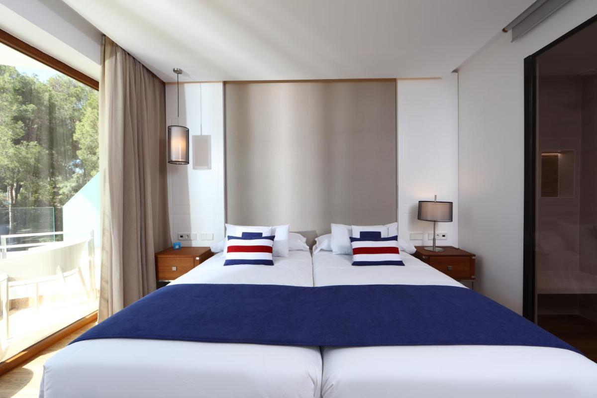 Cama o camas de una habitación en Hotel Son Caliu Spa Oasis