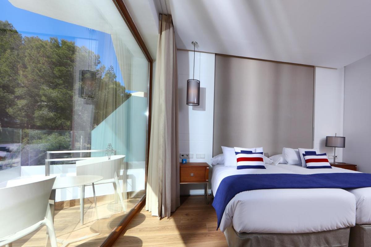 Cama o camas de una habitación en Hotel Son Caliu Spa Oasis