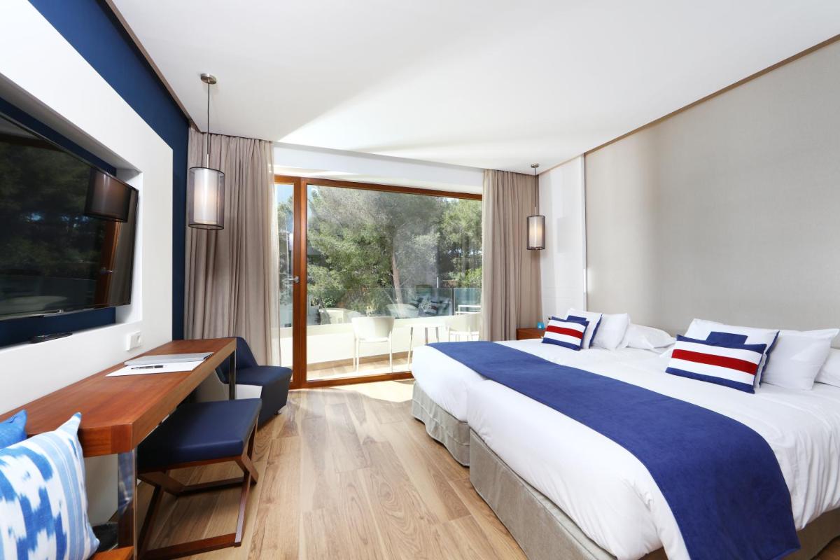 Cama o camas de una habitación en Hotel Son Caliu Spa Oasis