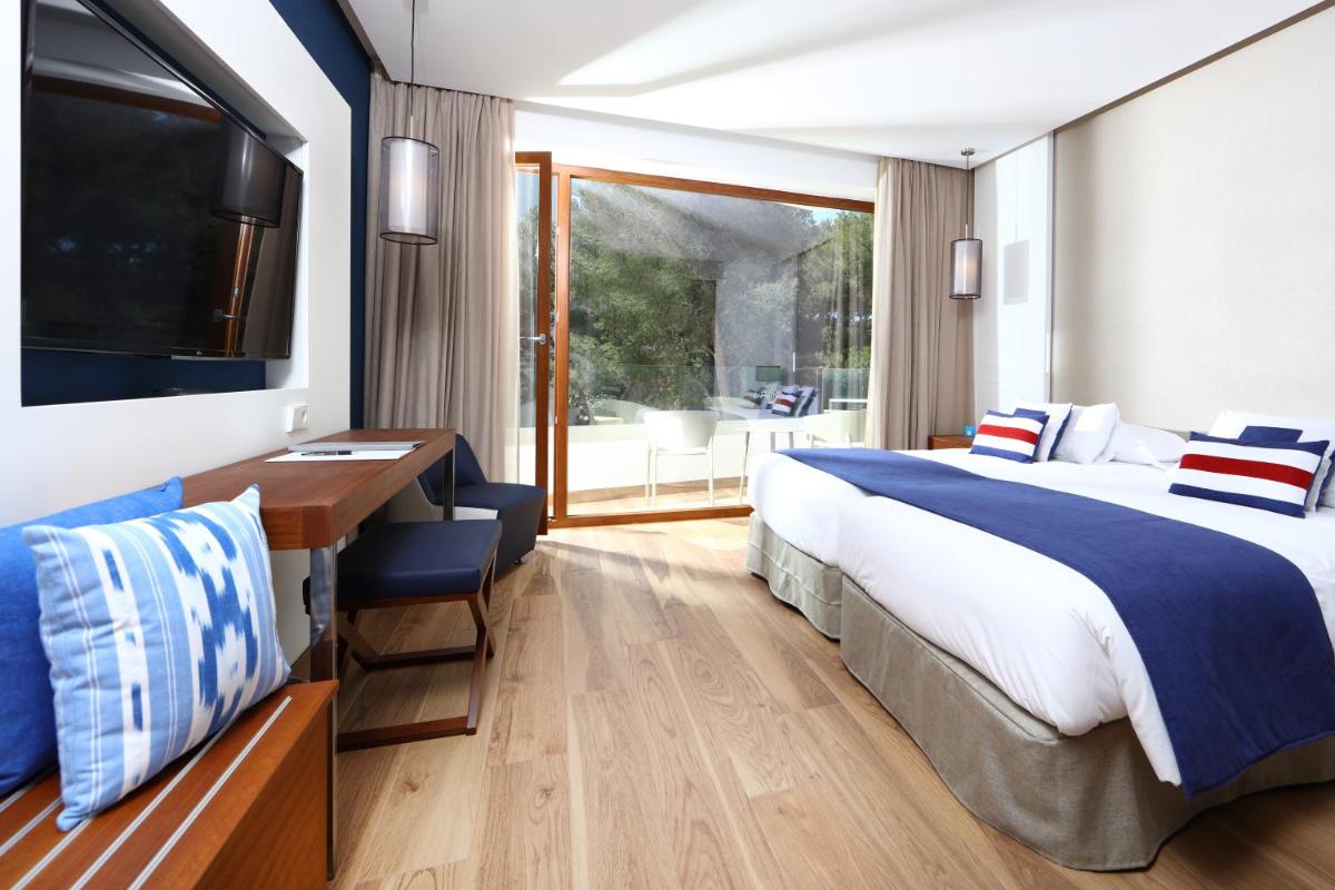 Cama o camas de una habitación en Hotel Son Caliu Spa Oasis