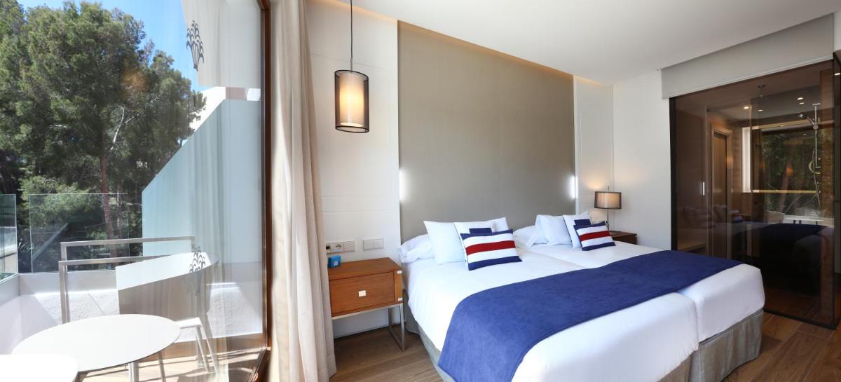 Cama o camas de una habitación en Hotel Son Caliu Spa Oasis