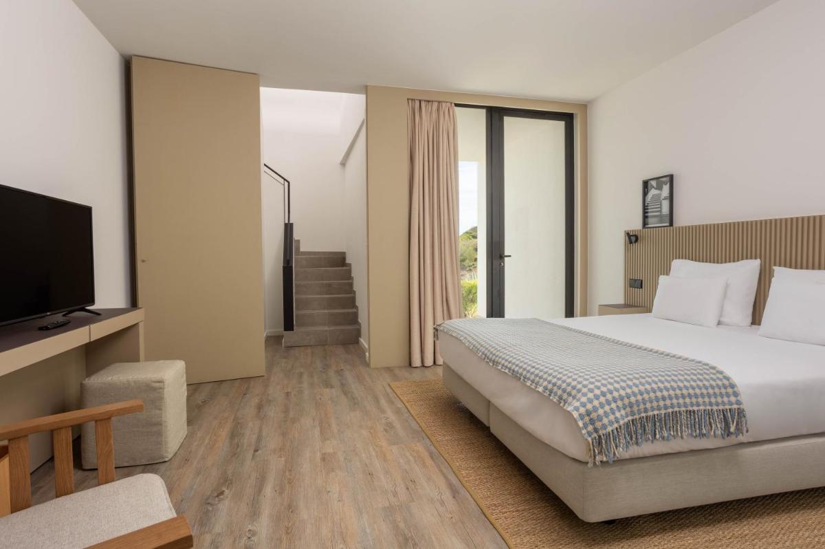 Uma cama ou camas num quarto em Memmo Baleeira - Design Hotels