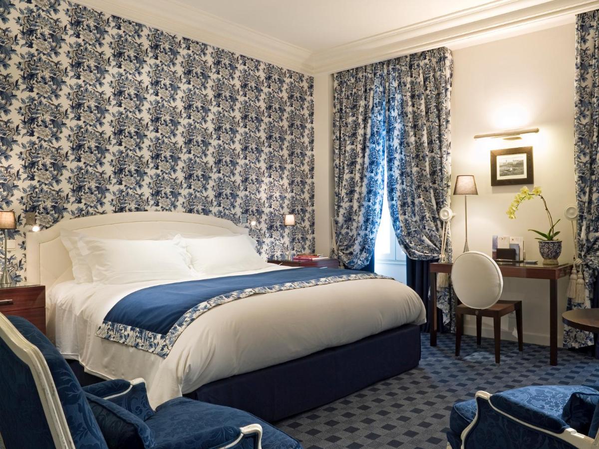 Un ou plusieurs lits dans un hébergement de l'établissement Le Royal Hotel Lyon - MGallery Collection
