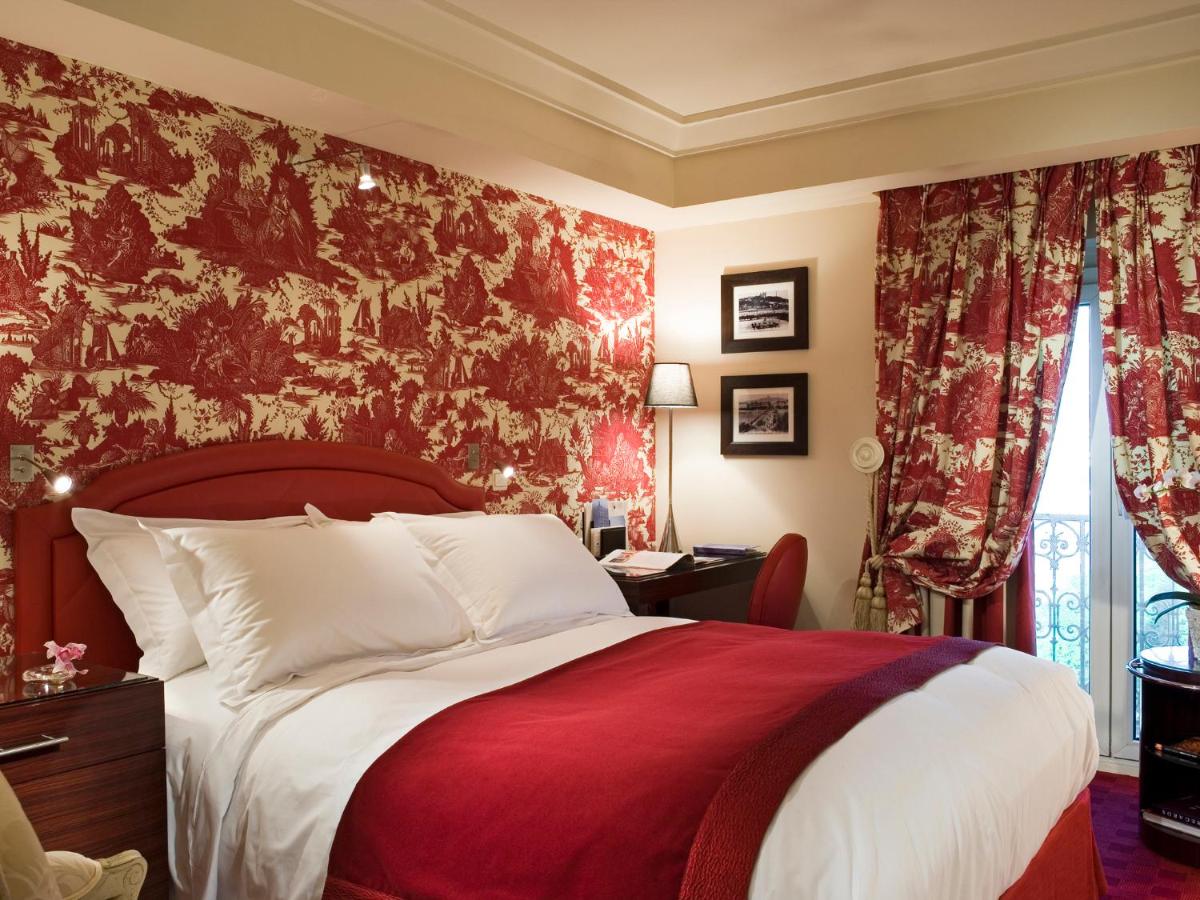 Un ou plusieurs lits dans un hébergement de l'établissement Le Royal Hotel Lyon - MGallery Collection