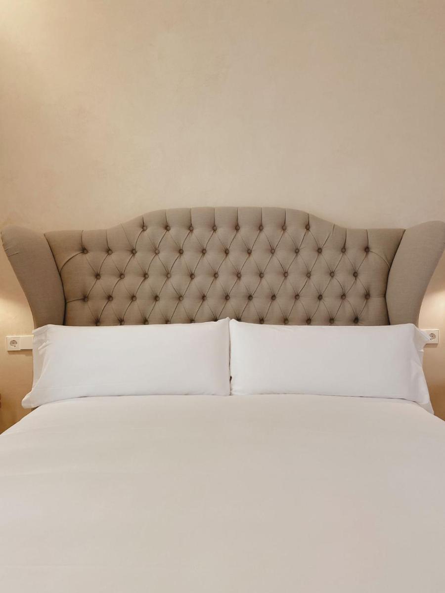 Cama o camas de una habitación en Hotel Palau Macelli & Spa