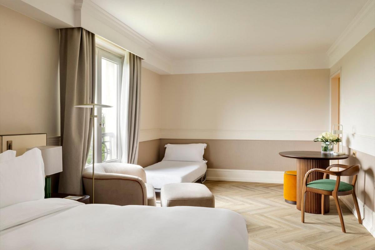 Un ou plusieurs lits dans un hébergement de l'établissement InterContinental Hotels Chantilly Chateau Mont Royal by IHG