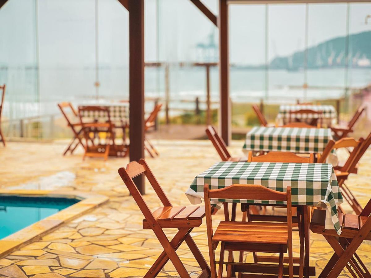 Chalé com Piscina Aquecida - a 200m do Mar, Vista Panorâmica da Praia, Sala de Jogos, Academia e Área de Churrasco - Housity