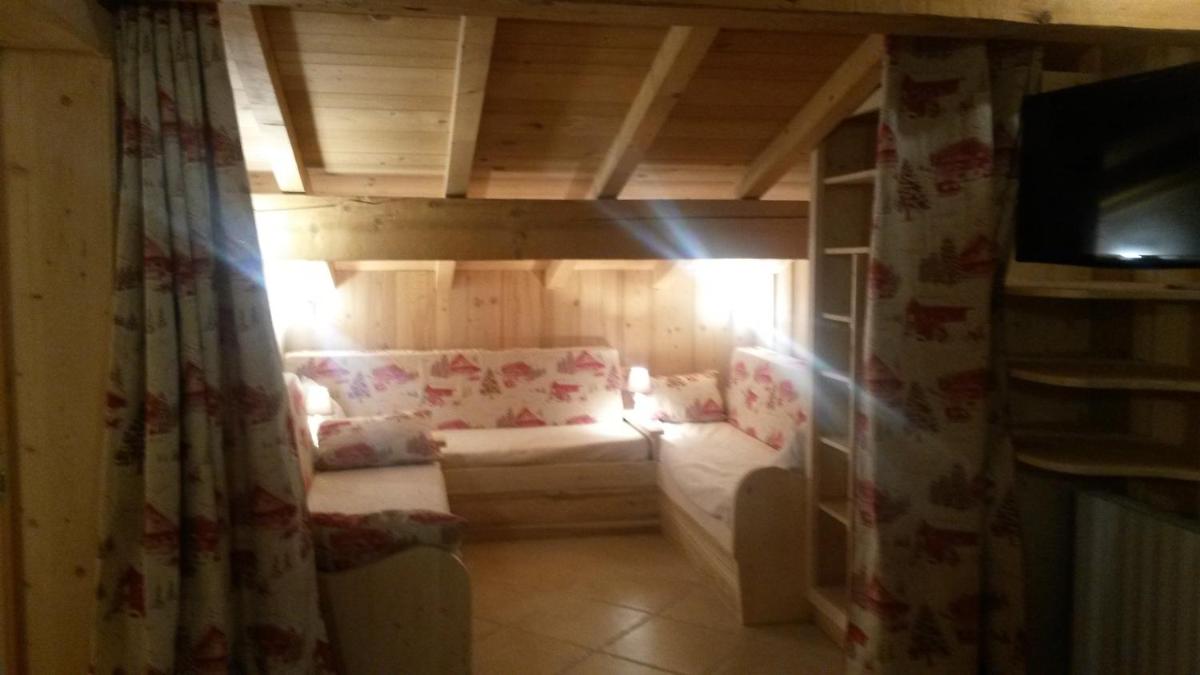 Un ou plusieurs lits dans un hébergement de l'établissement Apart'hotel & Spa "La Destière"