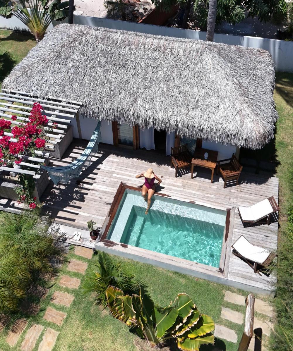 Tiki Pool's Bungalows - Housity