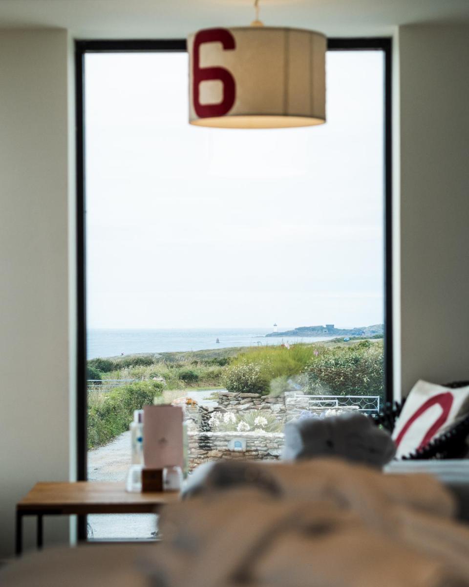 Un ou plusieurs lits dans un hébergement de l'établissement Hostellerie de la Pointe Saint-Mathieu - SPA & Restaurant