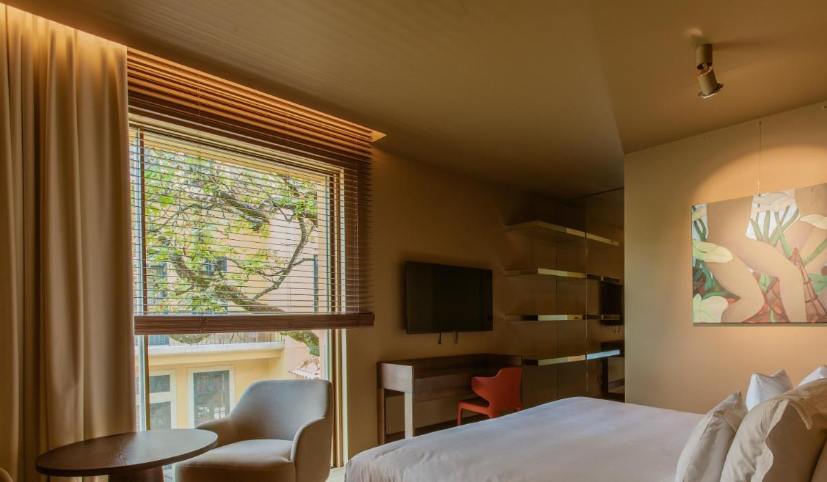 Uma cama ou camas num quarto em Palacete Severo