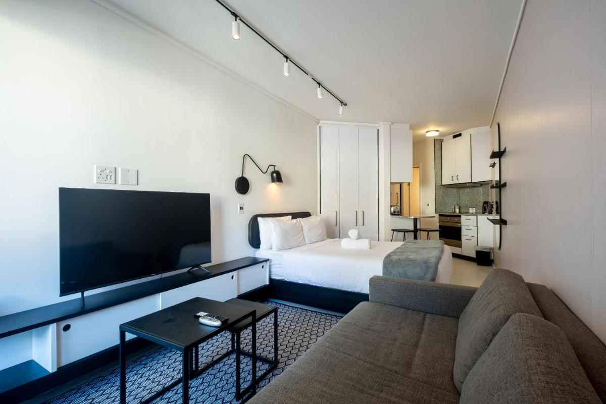 Flamingo 104: Modern Studio Unit with Balcony - Housity
